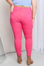The Katie, Hyper-Stretch Mid-Rise Skinny Jeans in Fiery Coral